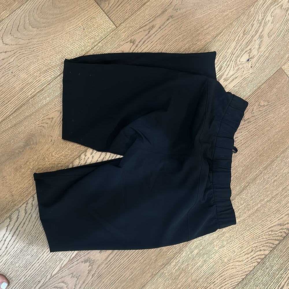 (6014) 🍋 LULULEMON On the Fly 7/8 Pant *Woven Sz 6 in Black - Picture 8 of 8
